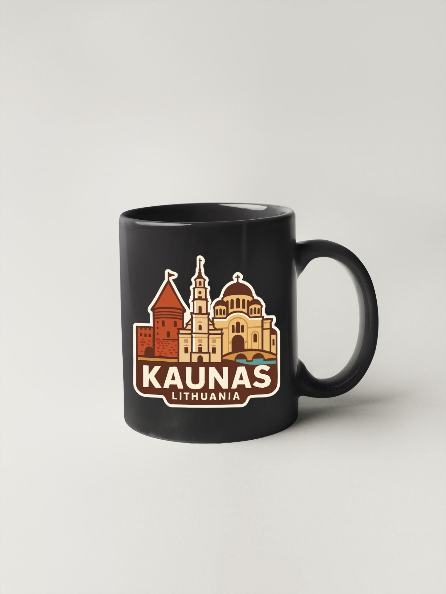 A black coffee mug with a graphic design depicting the cityscape of Kaunas, Lithuania.