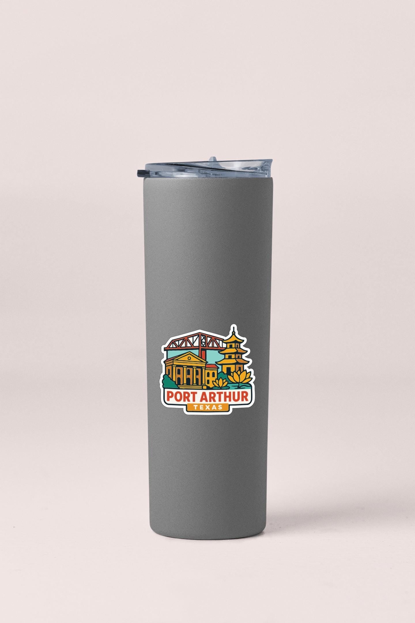 A gray insulated tumbler with a graphic design featuring a building and a bridge, along with the text "PORT ARTHUR" and "TEXAS".