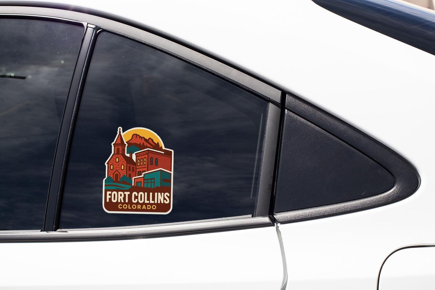 A sticker on the side of a car window, depicting Fort Collins, Colorado.