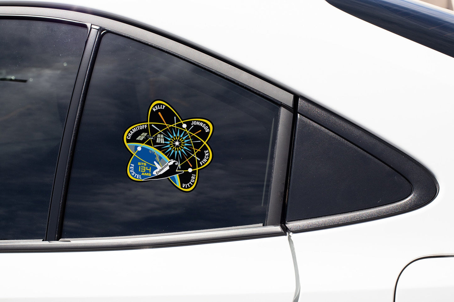 a sticker on the side of a white car