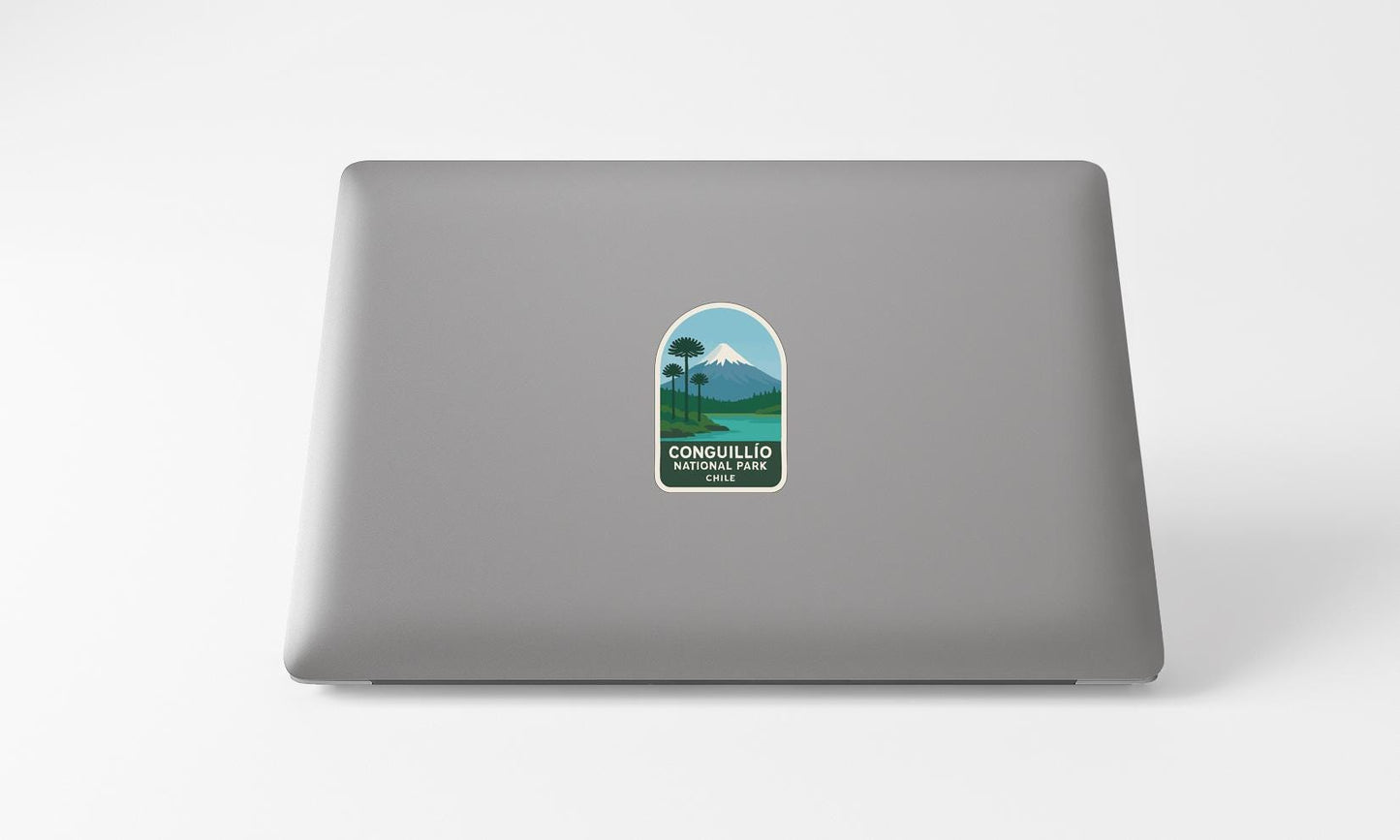 a sticker with a mountain landscape on a laptop.