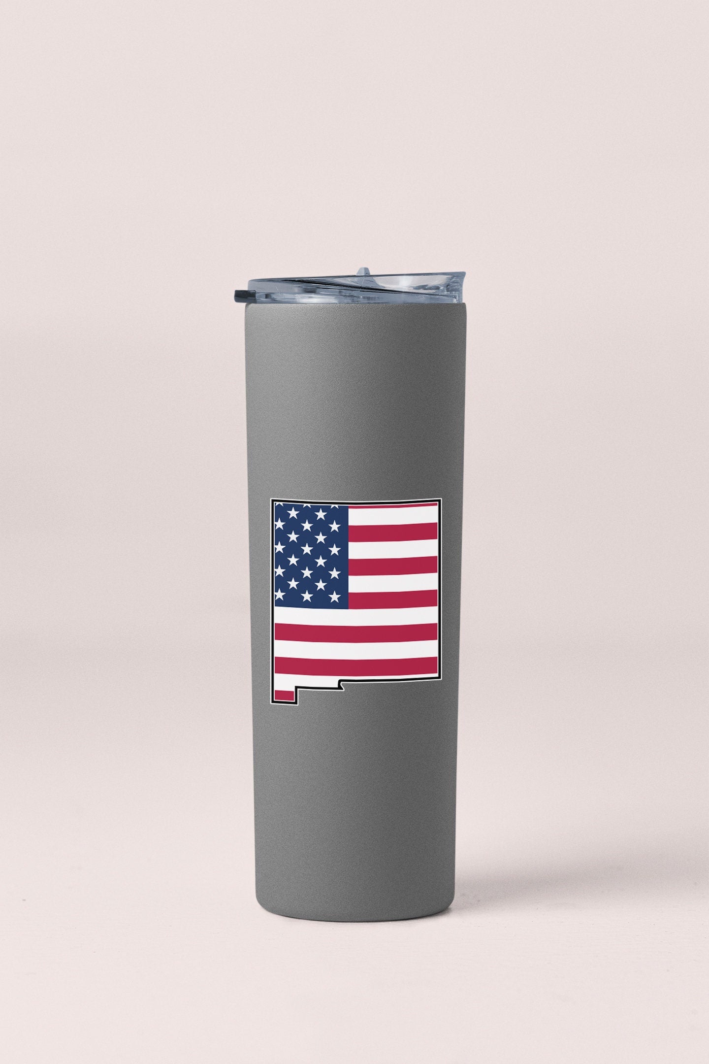 a stainless steel tumbler with the american flag on it