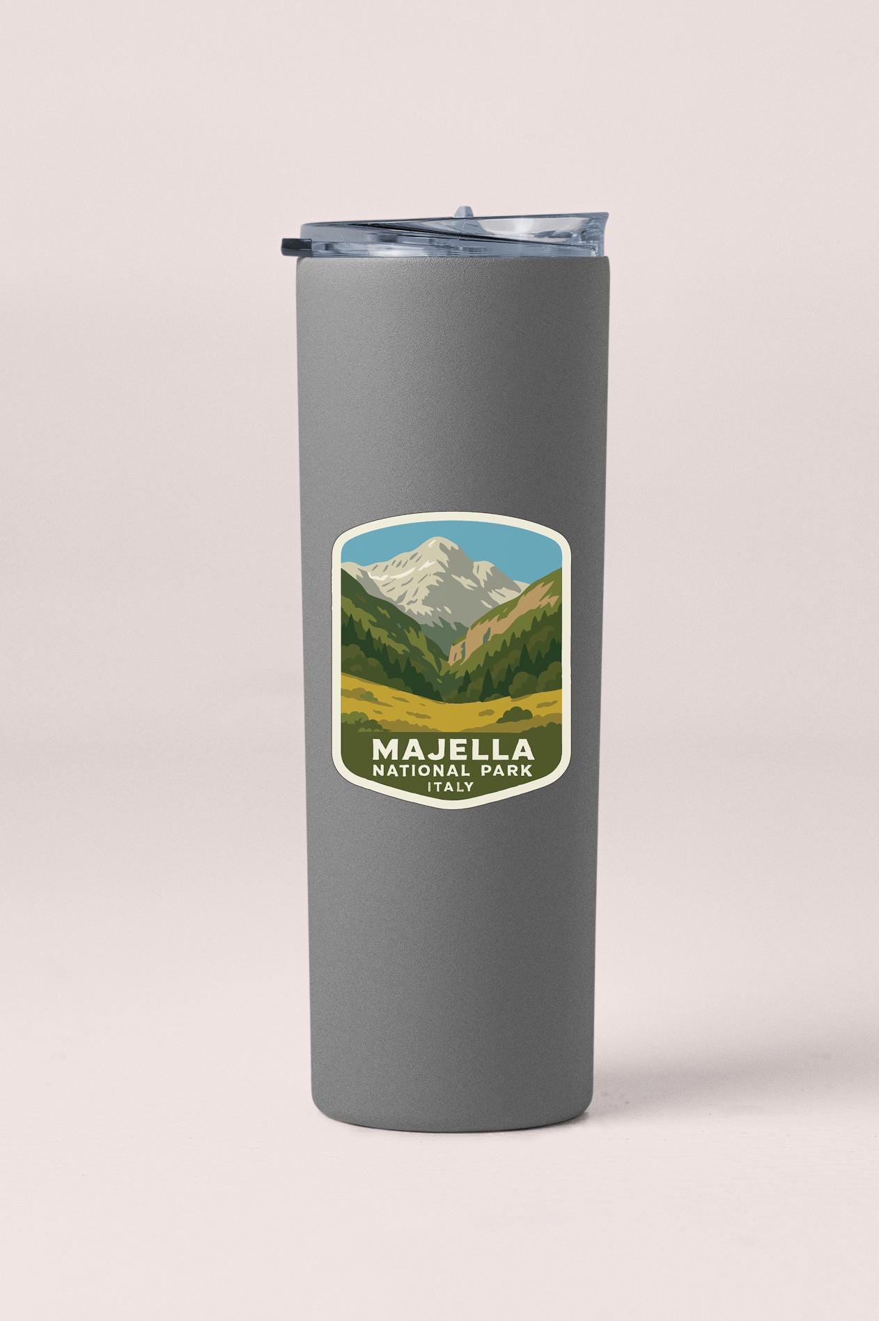 A gray insulated tumbler with a label that says "MAJELLA NATIONAL PARK ITALY".