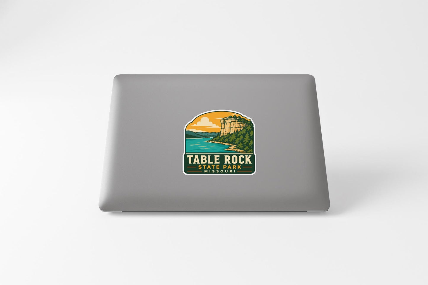 A sticker on the back of a laptop that says "TABLE ROCK STATE PARK MISSOURI".
