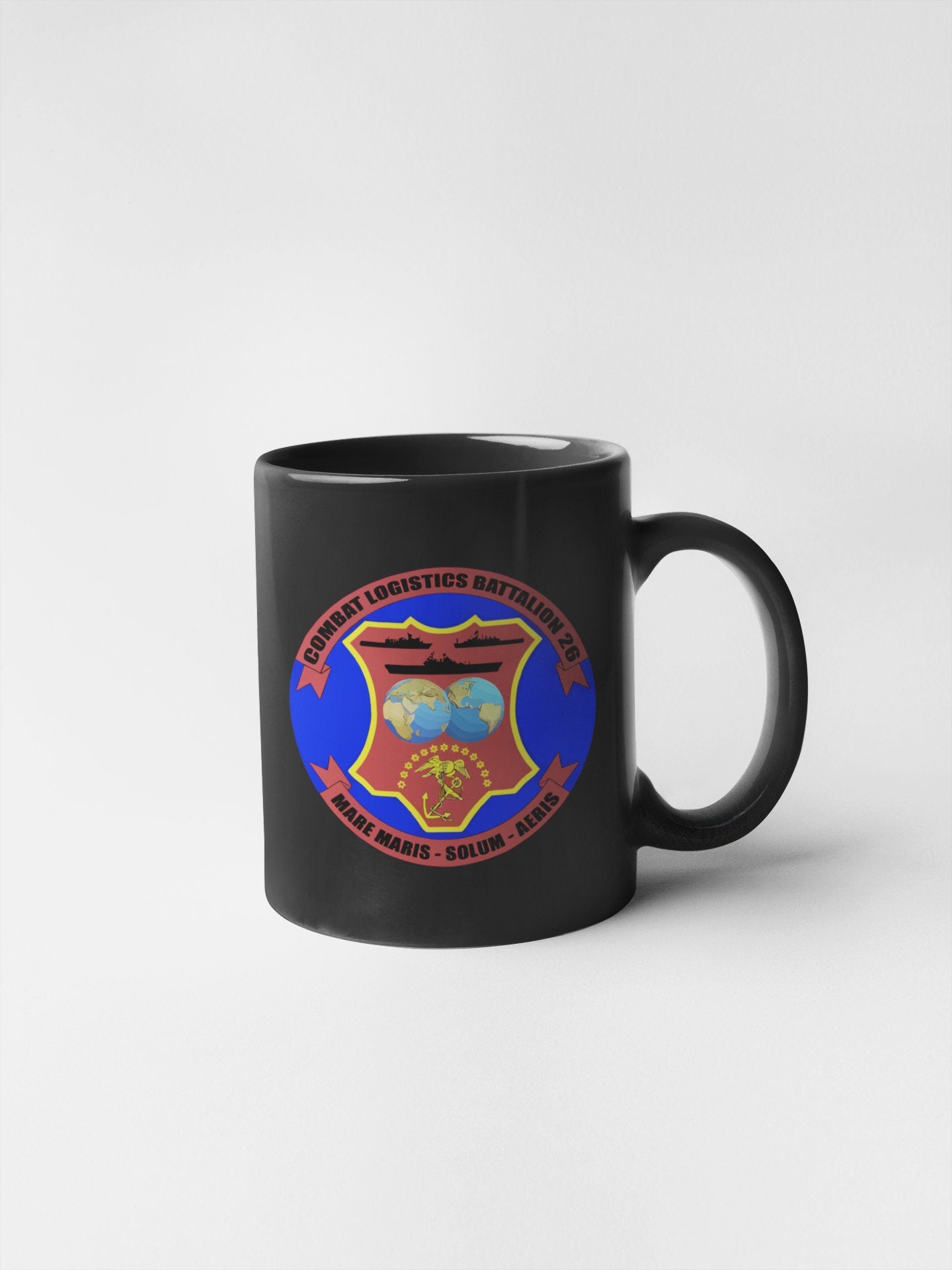 a black coffee mug with a blue and red emblem
