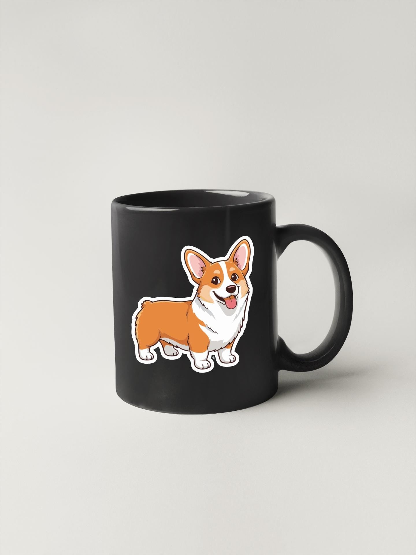 A black coffee mug with a cartoon illustration of a corgi dog on it.