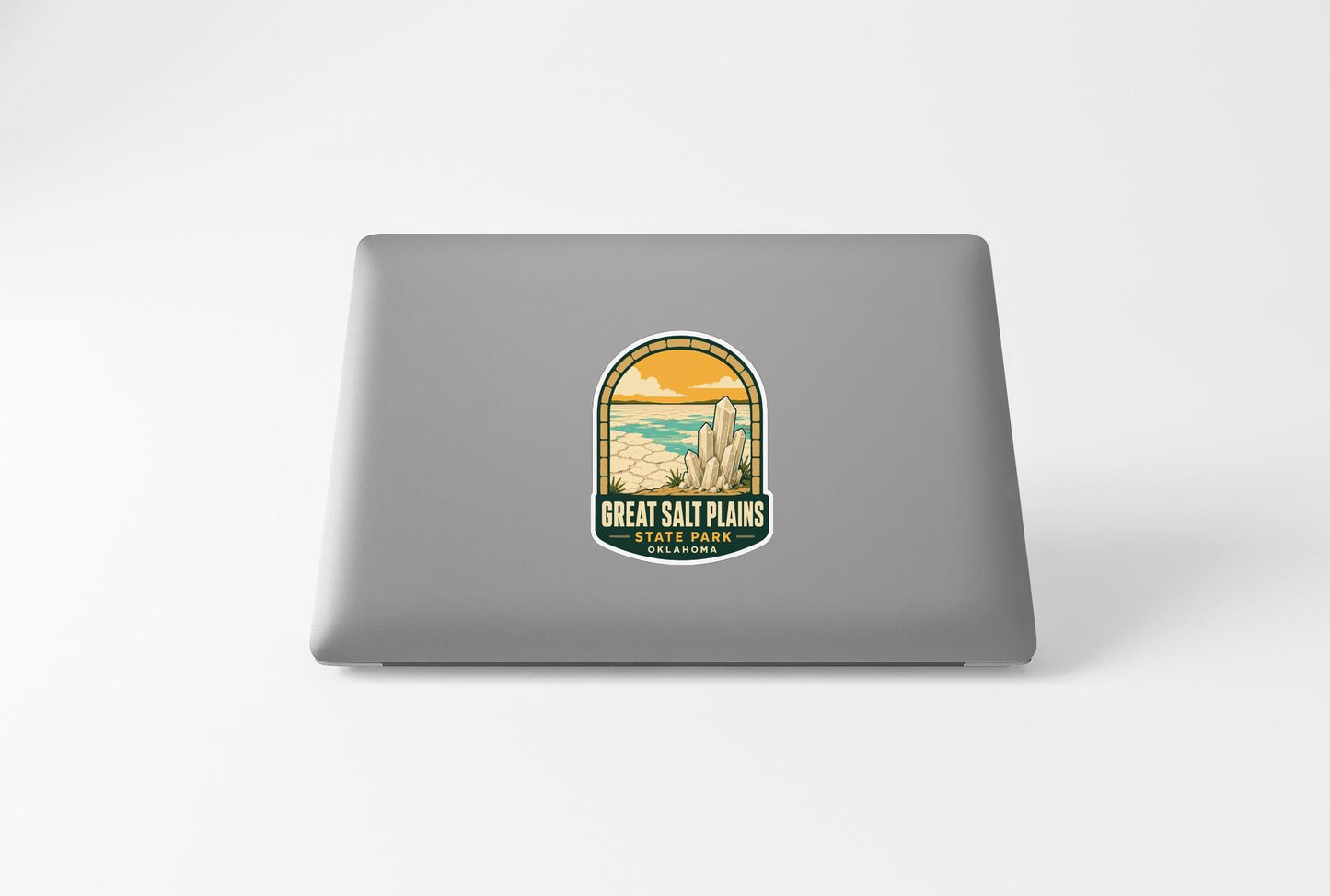 a sticker on the back of a laptop that says "Great Salt Plains" and "Start Here".