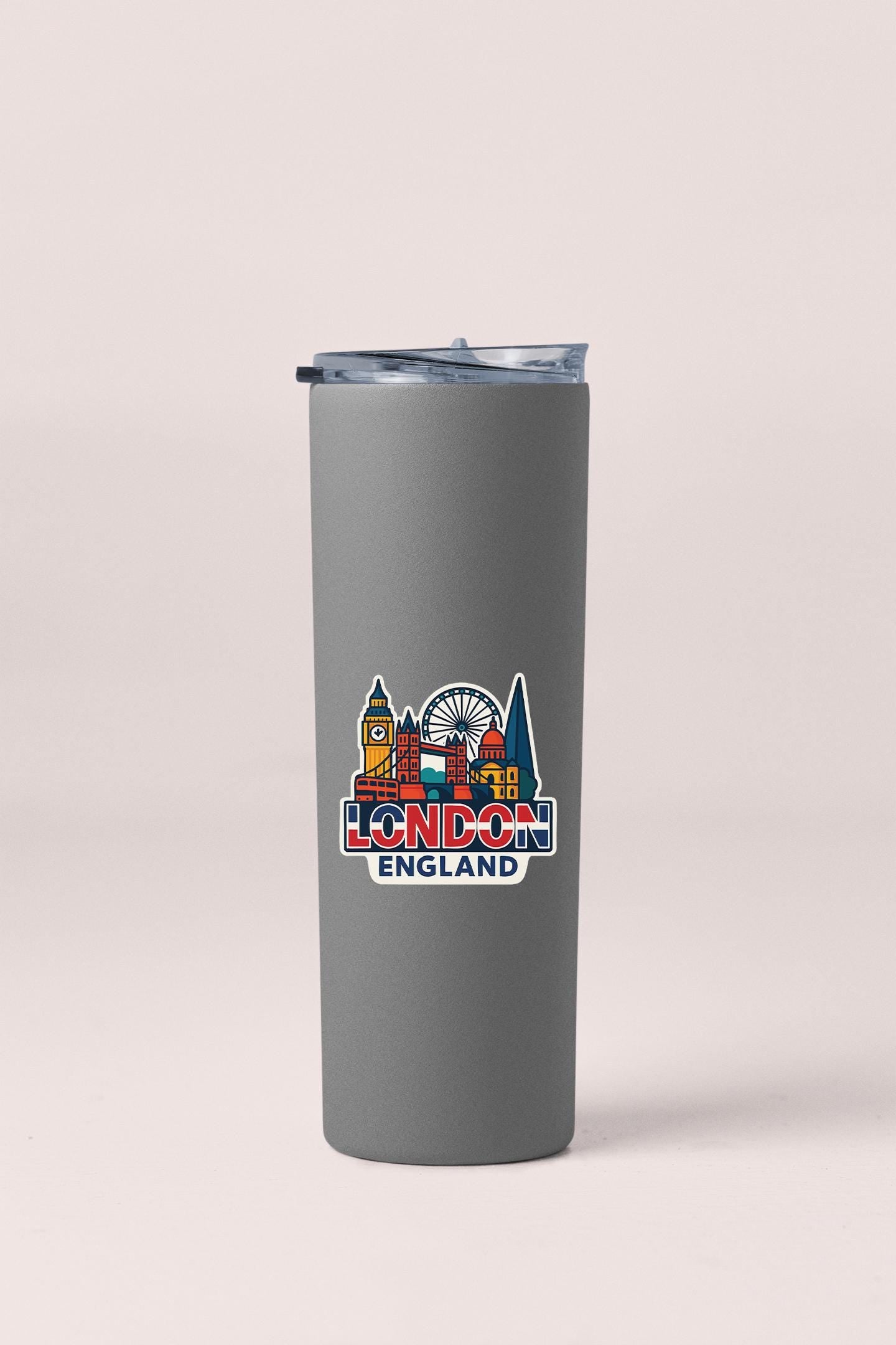 a stainless steel travel mug with the london england skyline on it