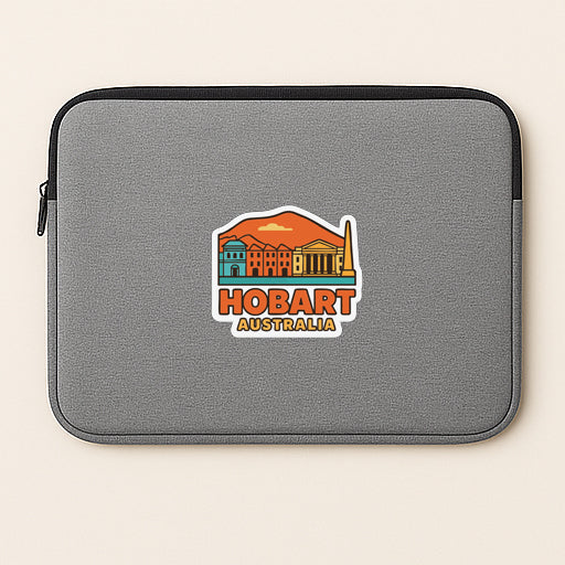A gray laptop sleeve with a sticker depicting the city of Hobart, Australia.