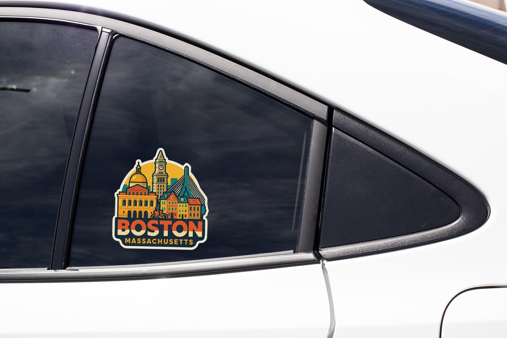 a boston sticker on the side of a car
