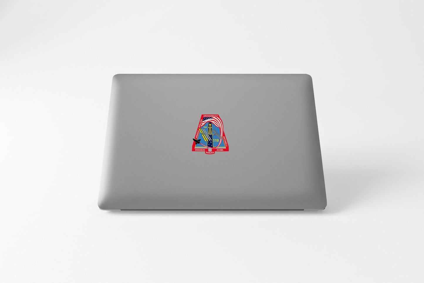 a laptop computer with a picture of a person on it