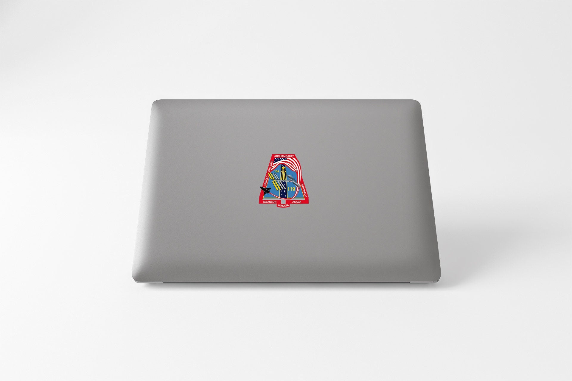 a laptop computer with a picture of a person on it