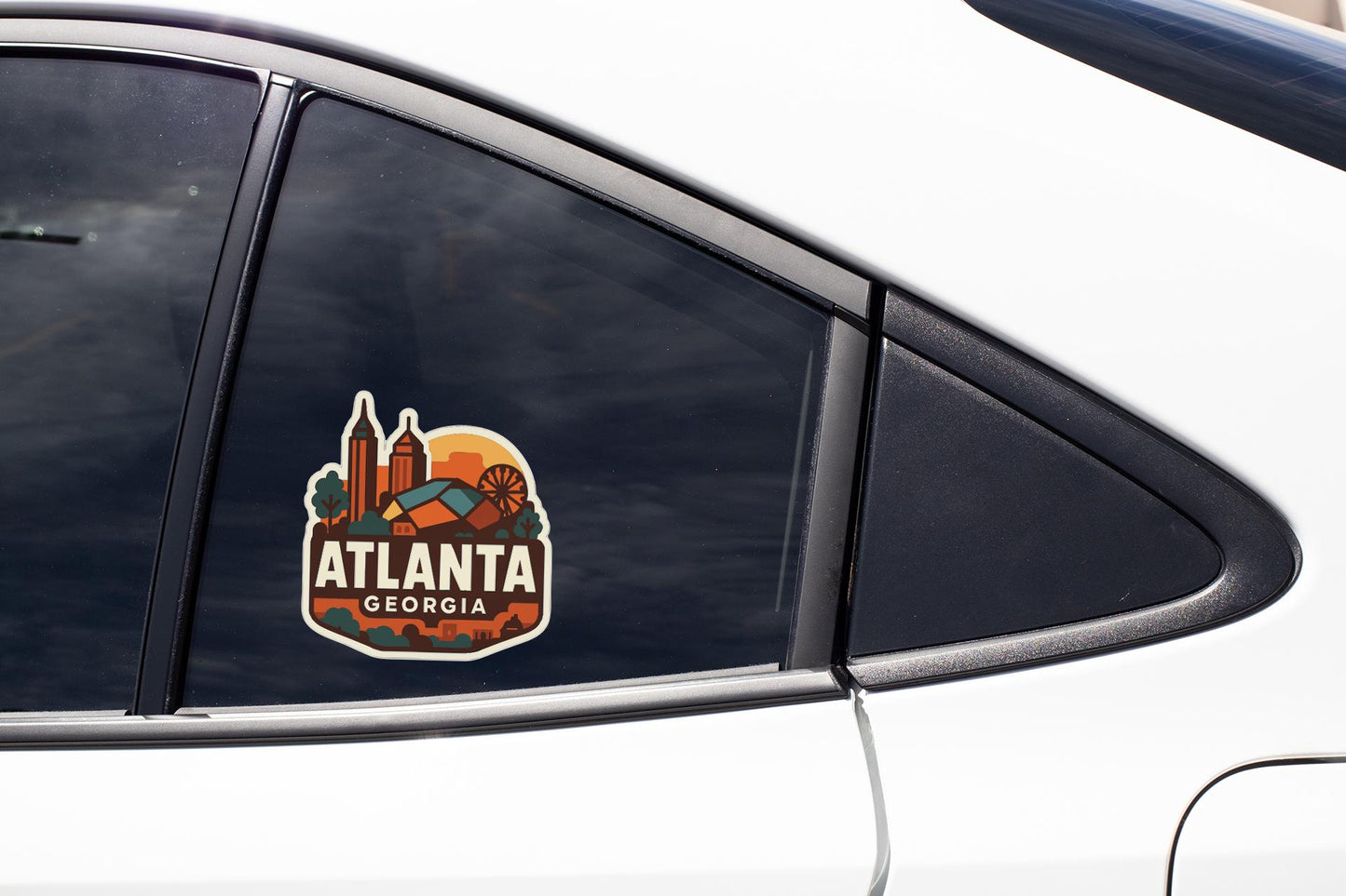 A sticker on the side of a car window that says "ATLANTA GEORGIA".