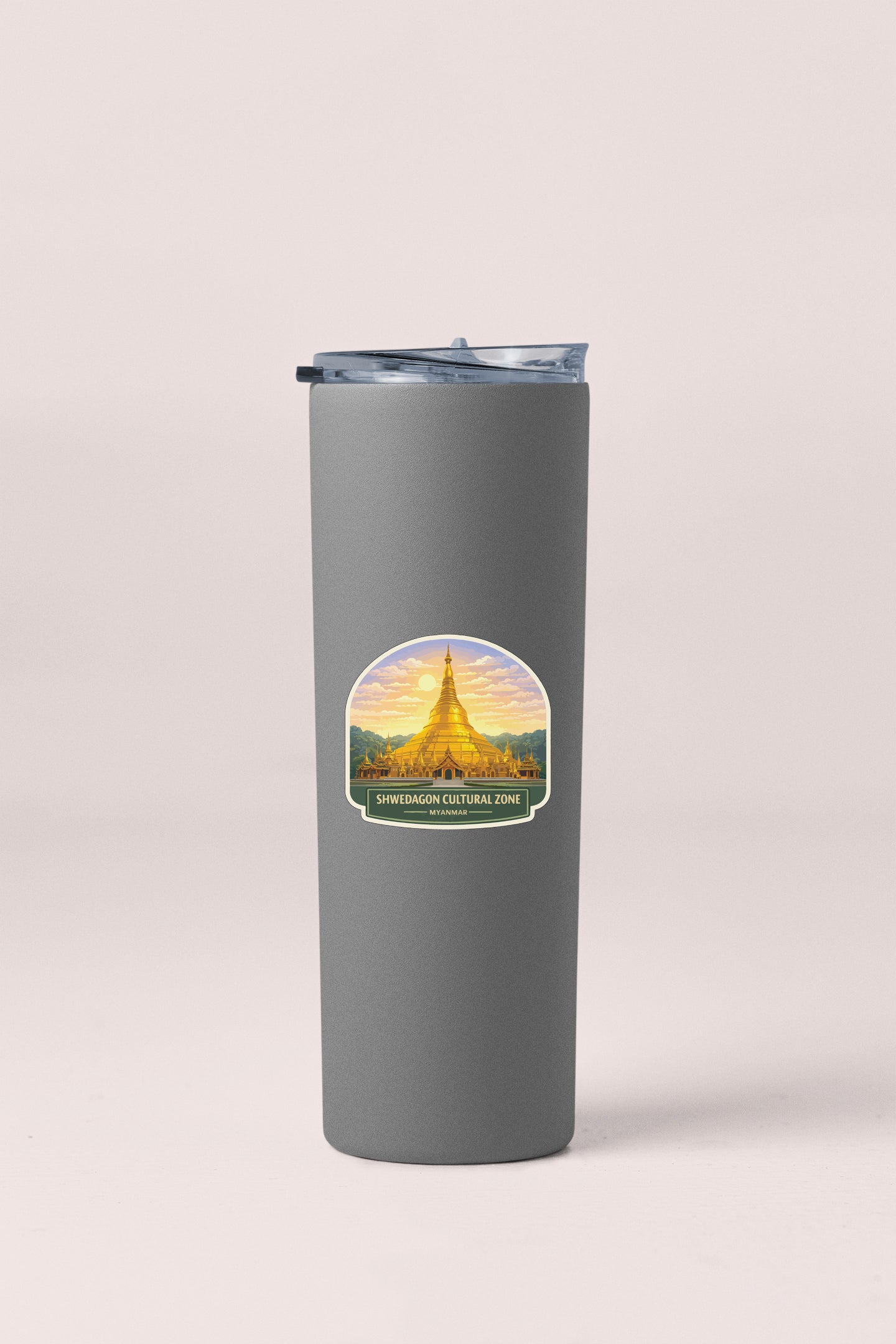 A gray insulated tumbler with a sticker depicting a temple or cultural site.