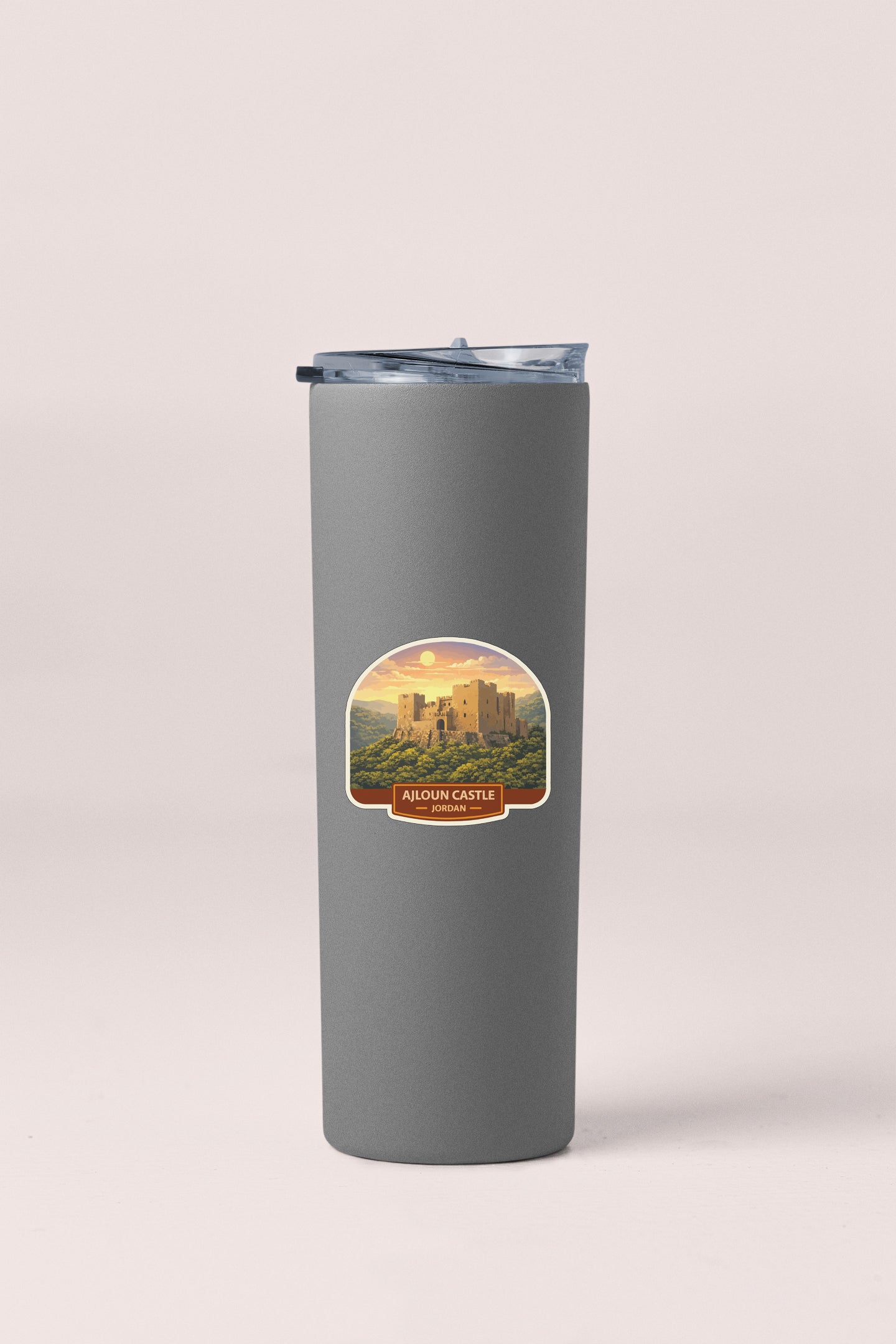 A gray insulated tumbler with a label that says "Alden Castle" and features an image of a castle.