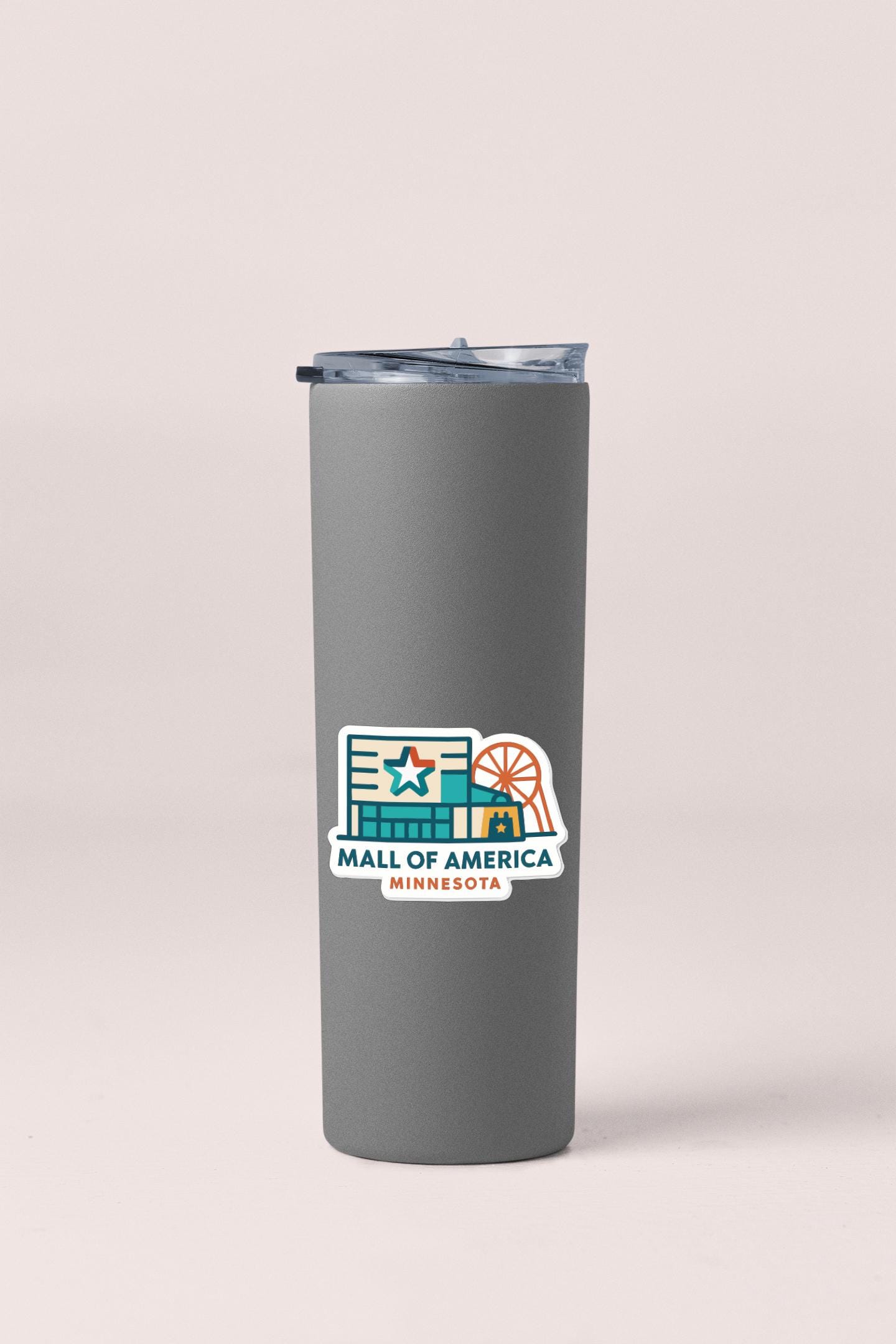 A gray insulated tumbler with a logo that says "MALL OF AMERICA MINNESOTA".