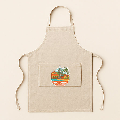 A beige apricot with a graphic of a cityscape and the text "VICTORIA" printed on it.