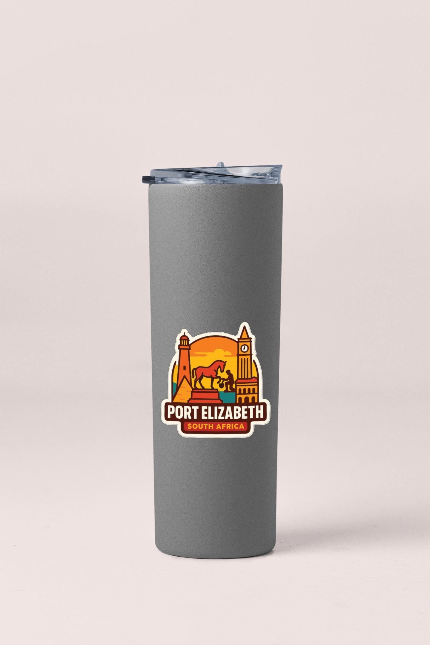 A gray insulated tumbler with a lid and a sticker featuring a graphic of a city skyline and the text "PORT ELIZABETH SOUTH AFRICA".