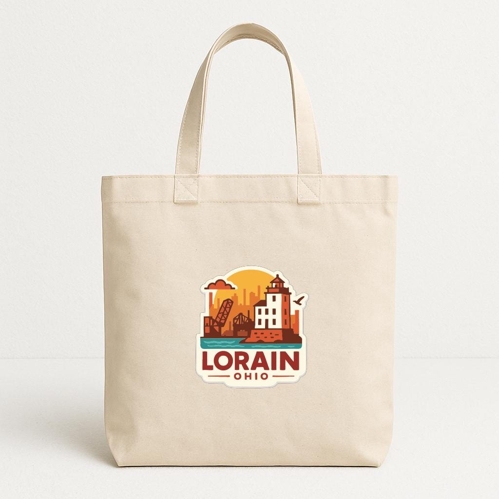 A beige tote bag with a graphic design featuring a city skyline and the text "LORAIN, OHIO" printed on it.