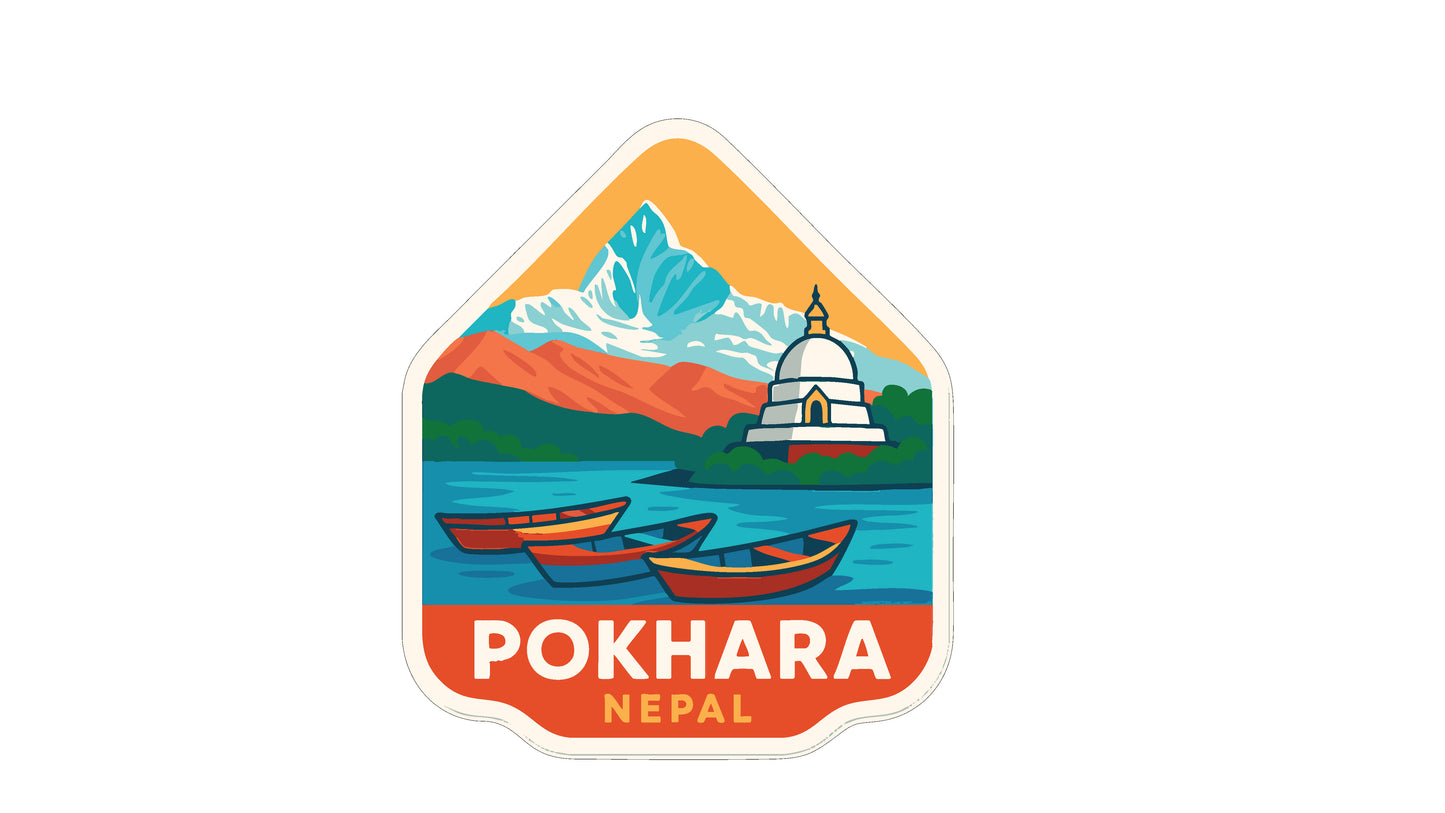 a sticker or emblem with a mountain landscape and a temple, along with two boats on a body of water.
