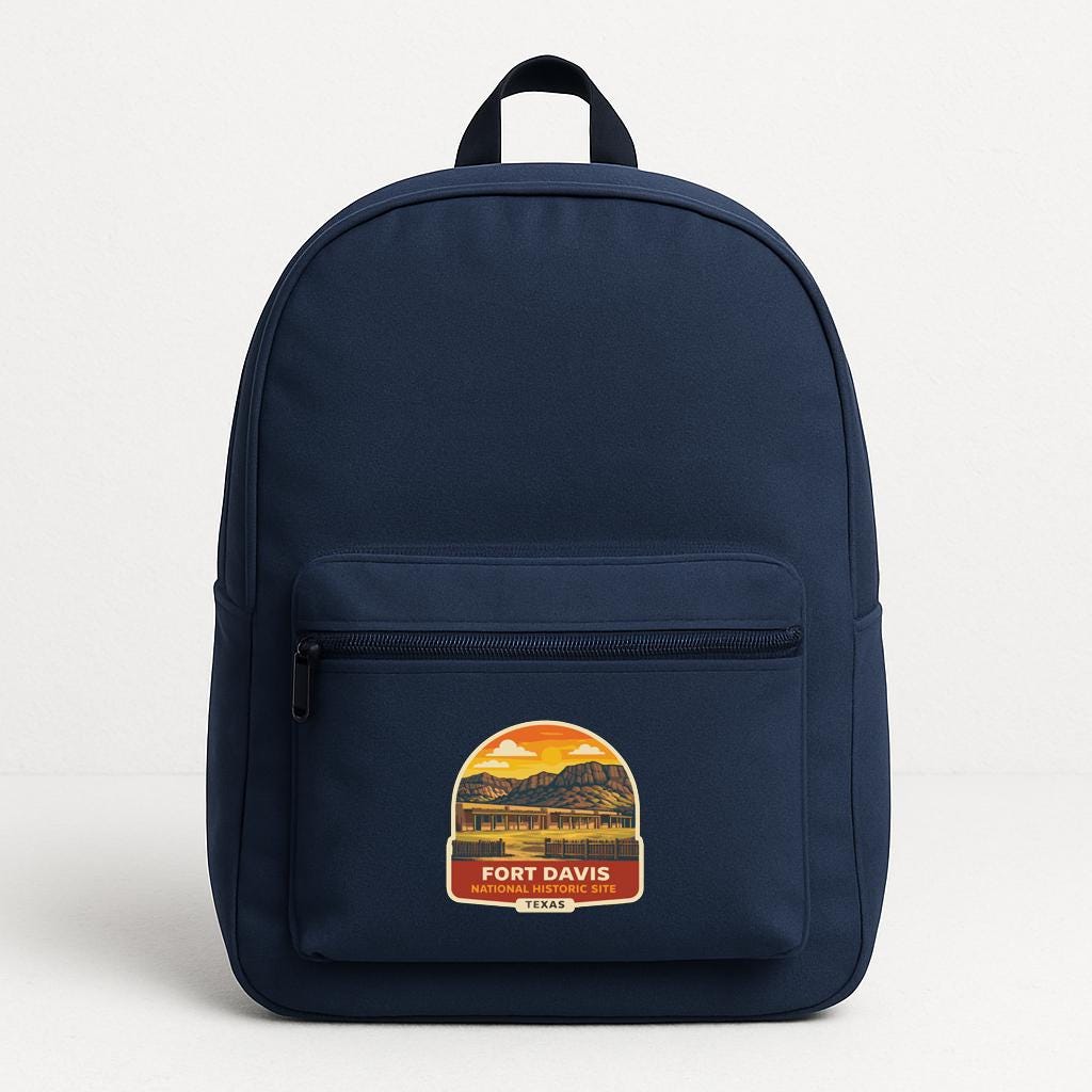 A navy blue backpack with a graphic of Fort Davis National Historic Site on the front pocket.
