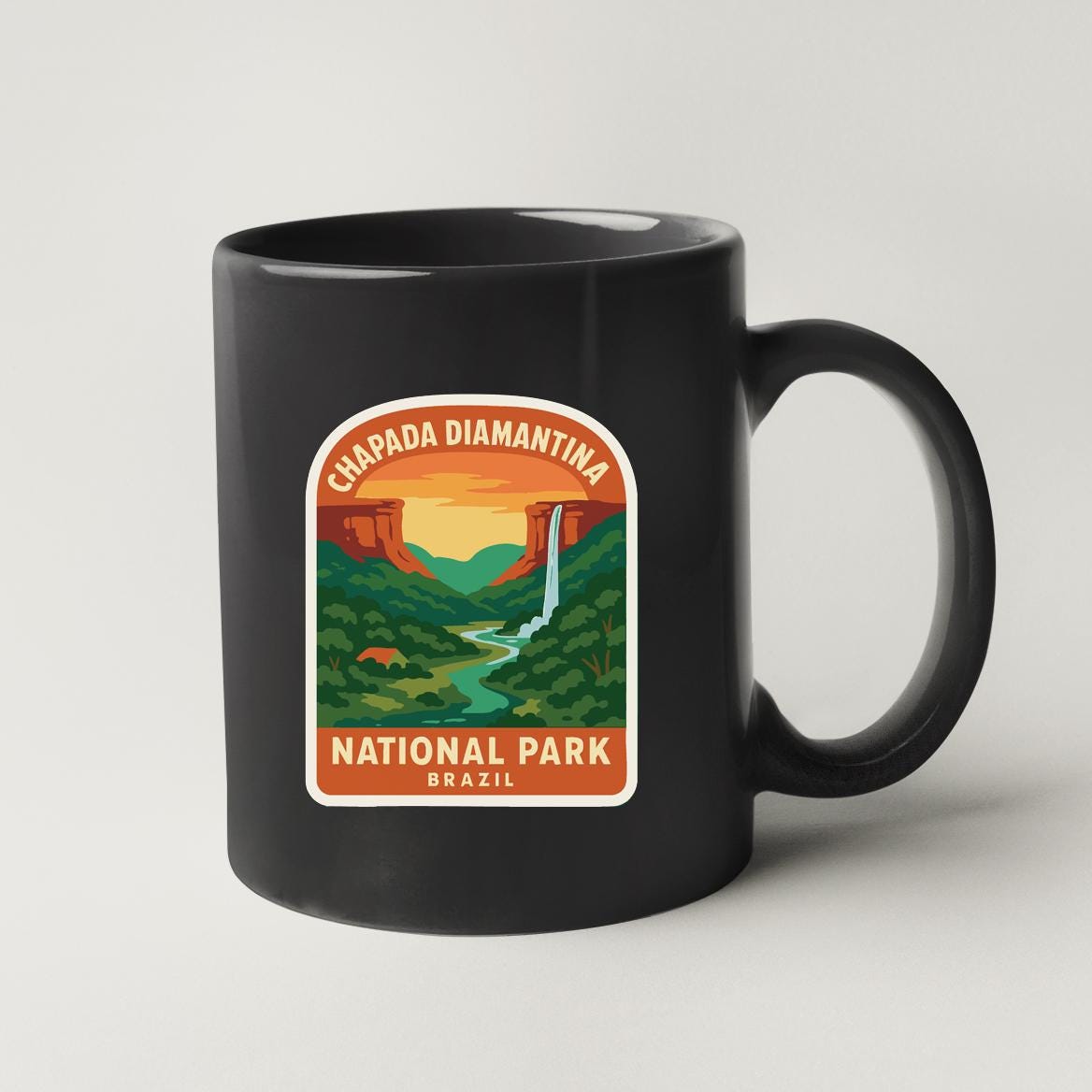 A black coffee mug with a label that says "CHAPADA DIAMANTINA NATIONAL PARK BRAZIL".