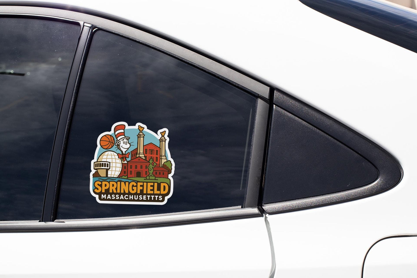 A sticker on the side of a car window, depicting a city skyline with a basketball player and the text "Springfield, Massachusetts".