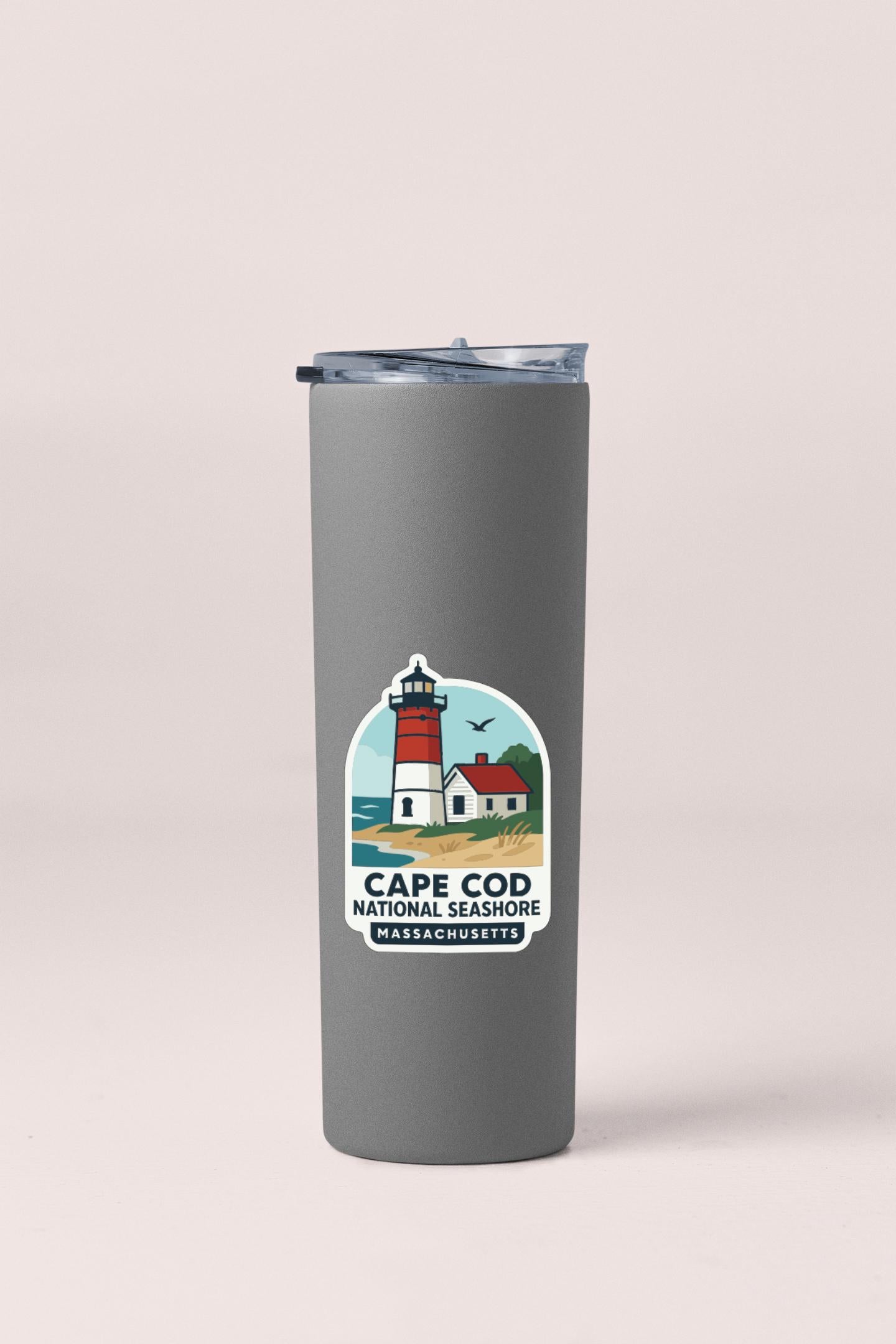 A gray insulated tumbler with a label that says "Cape Cod National Seashore Massachusetts" on it.