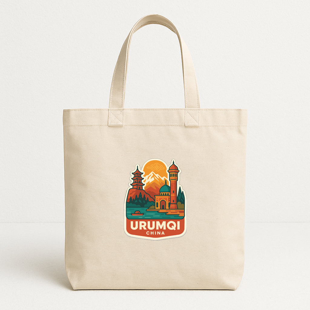 A beige tote bag with a printed design depicting a scenic view of Urumqi, China.