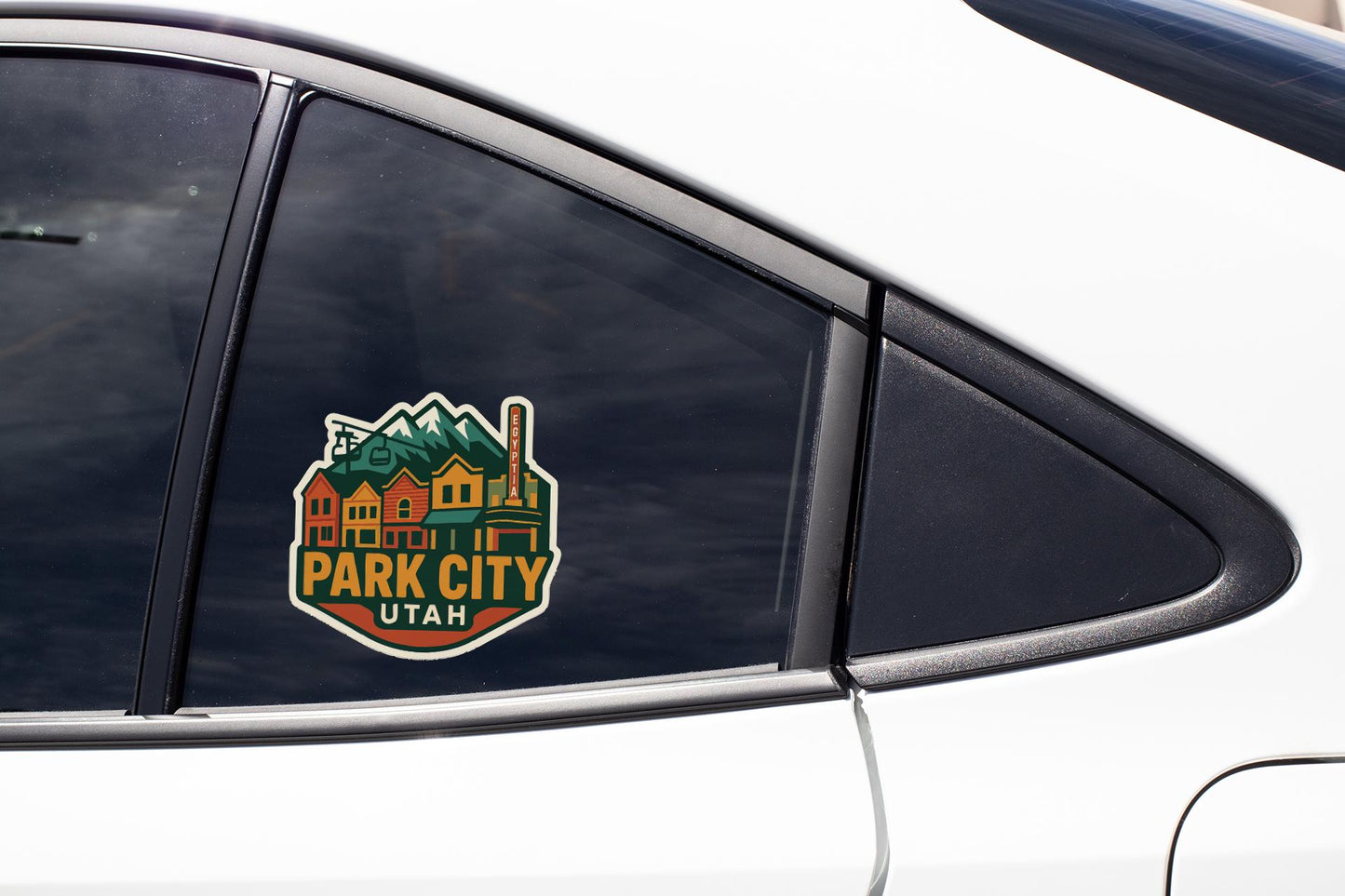 A sticker on the side of a car window that says "Park City Utah".