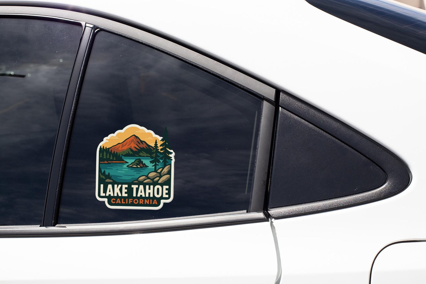 A sticker on the side of a car window that says "LAKE TAHOE, CALIFORNIA".