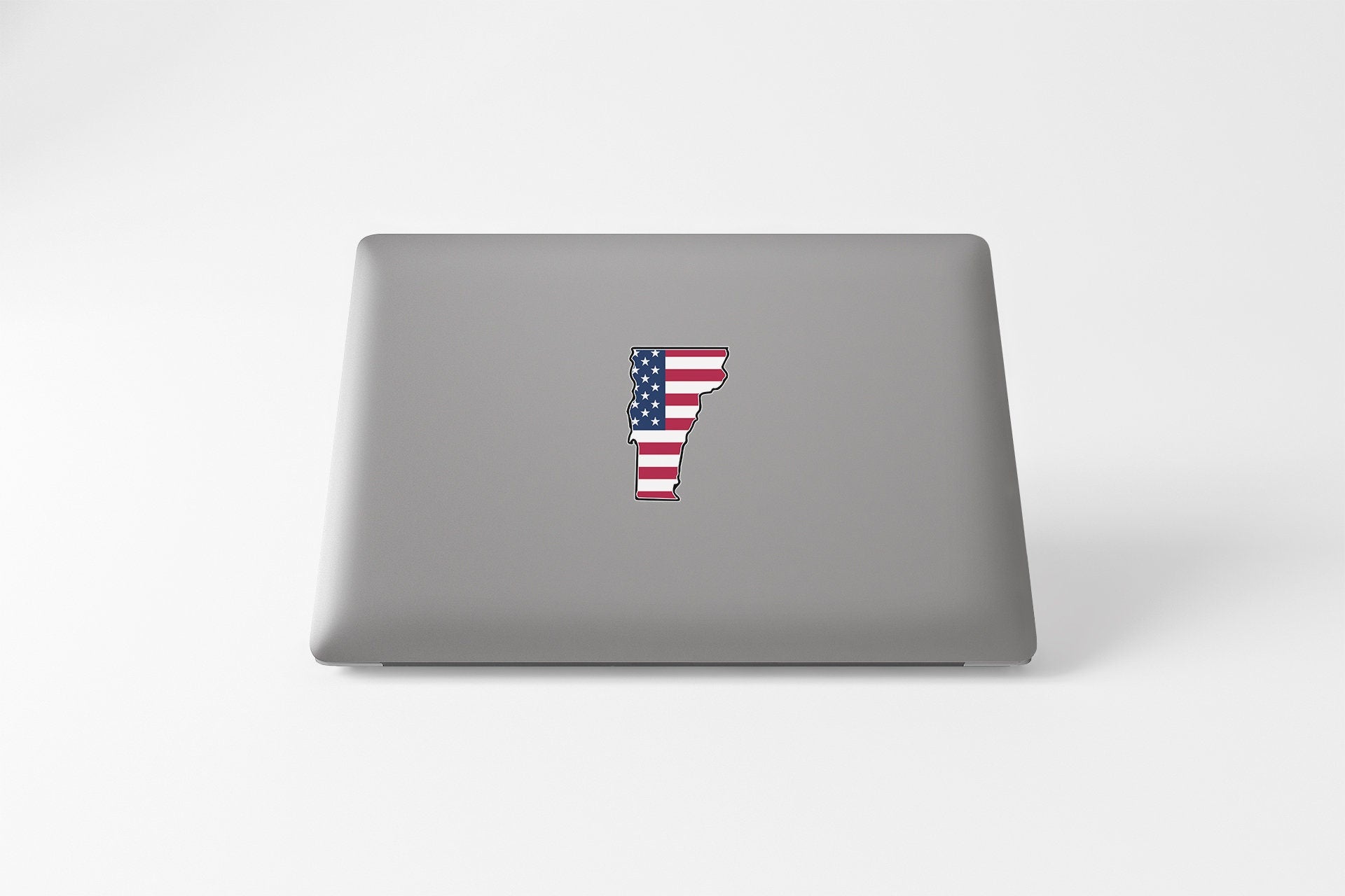 a laptop with the letter f painted on it