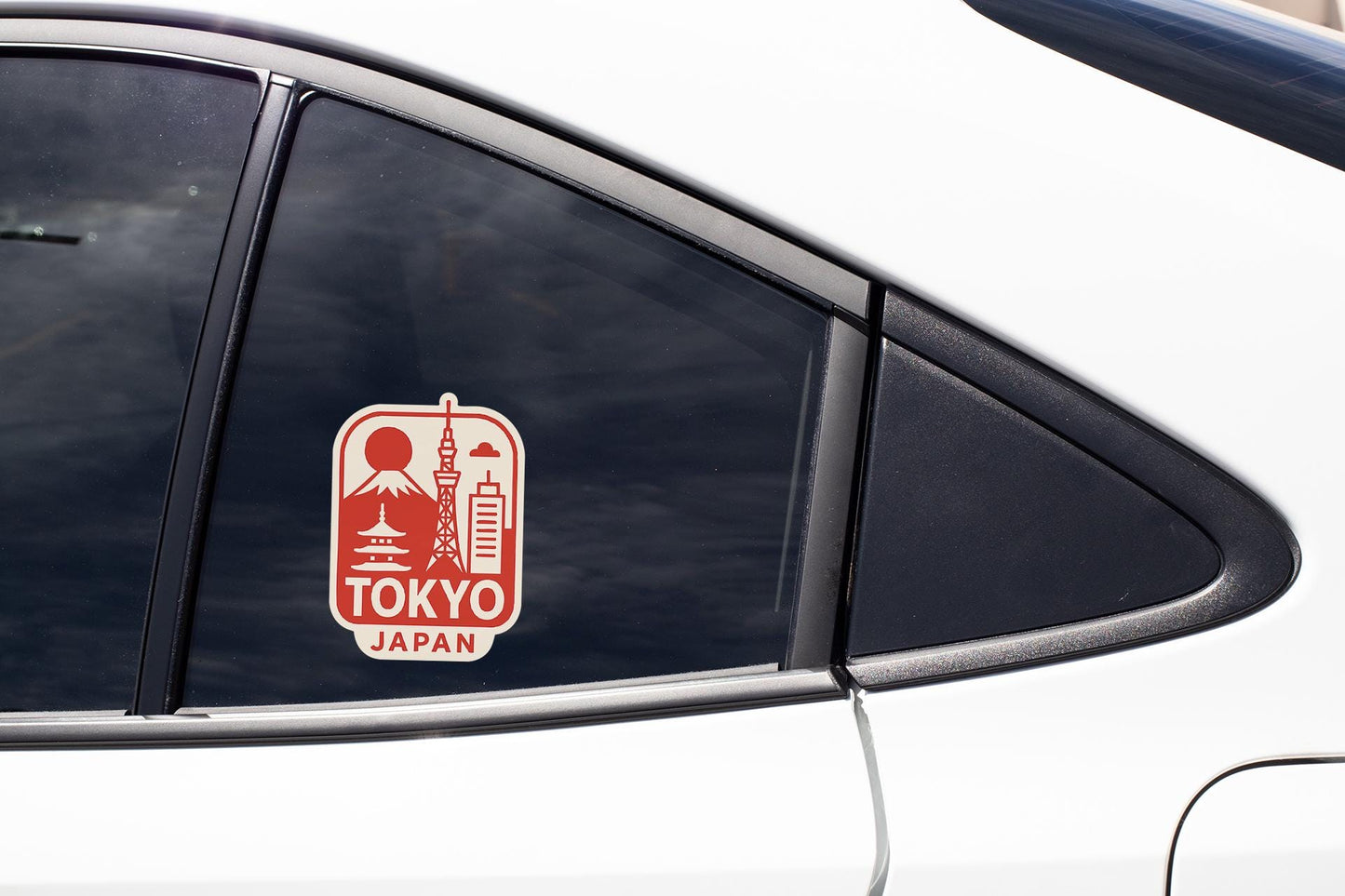 a sticker on the side of a white car