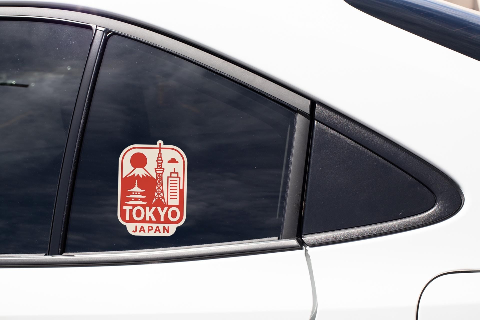 a sticker on the side of a white car