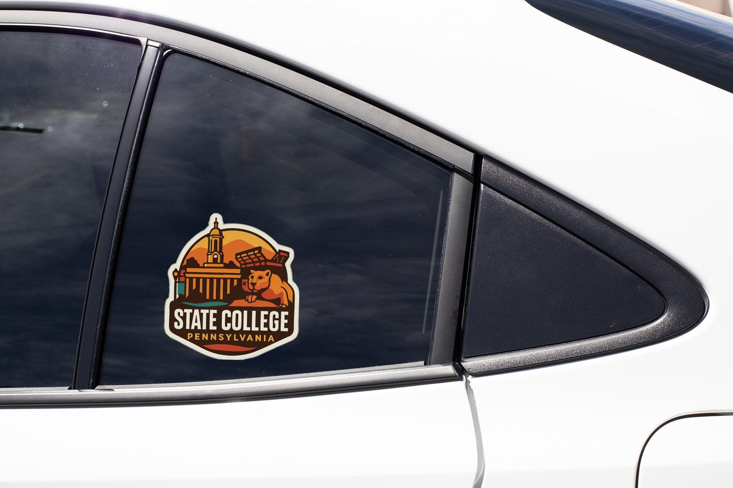 A sticker on the side of a car window, featuring the logo and name of a college.