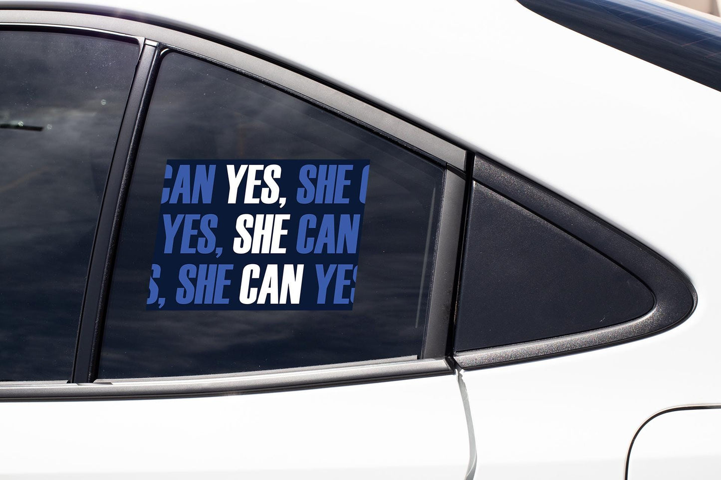 a car with a sticker that says yes, she can and she can '