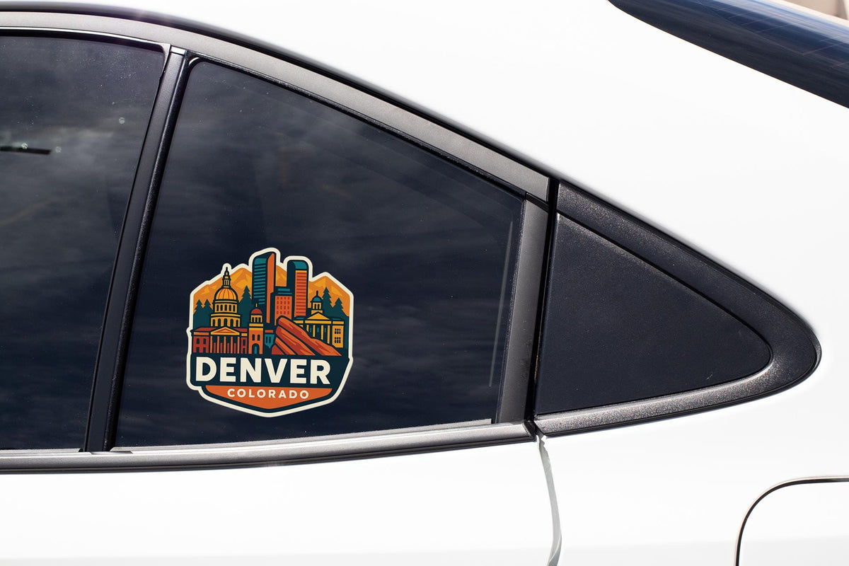 a car with a denver sticker on it's side window
