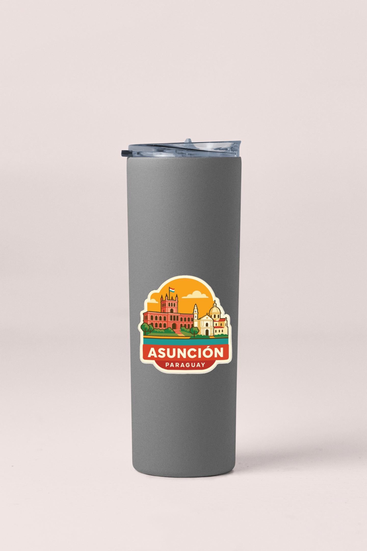 A gray insulated tumbler with a sticker depicting the city of Asunción, Parañaque.