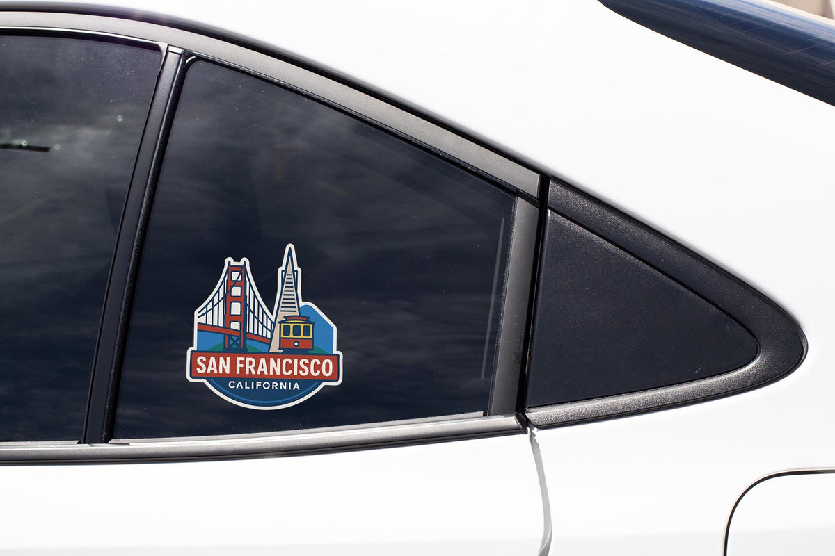 a san francisco sticker on the side of a car