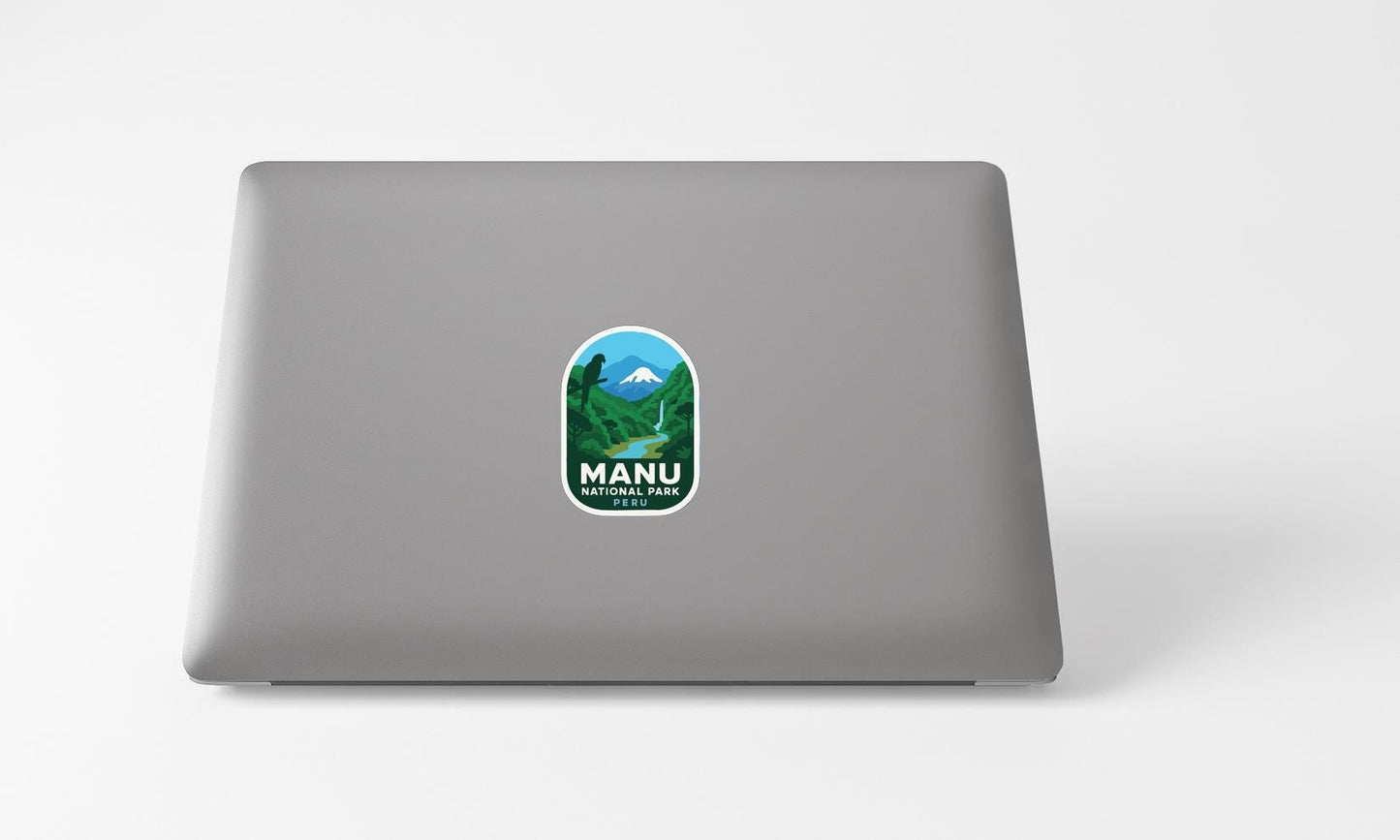 A sticker on the back of a laptop displaying the text "MANU NATIONAL PARK PERU".