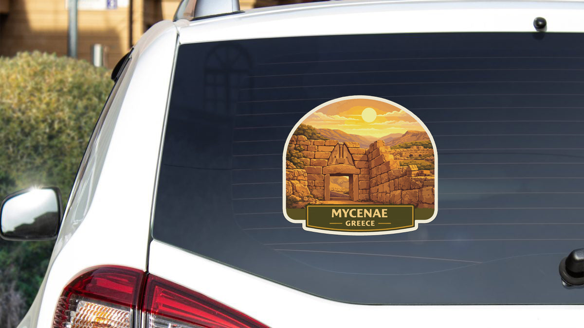 a sticker on the rear window of a car that displays a scenic image of a Greek island, with the text "MYCENAE Greece" below the image.