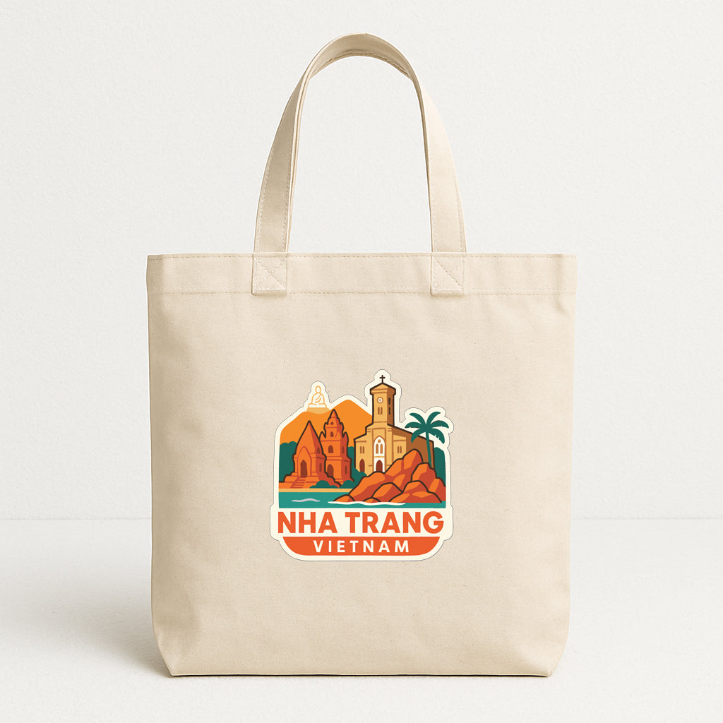 A beige tote bag with a printed design depicting a cityscape and landmarks, along with the text "NHA TRANG VIETNAM".