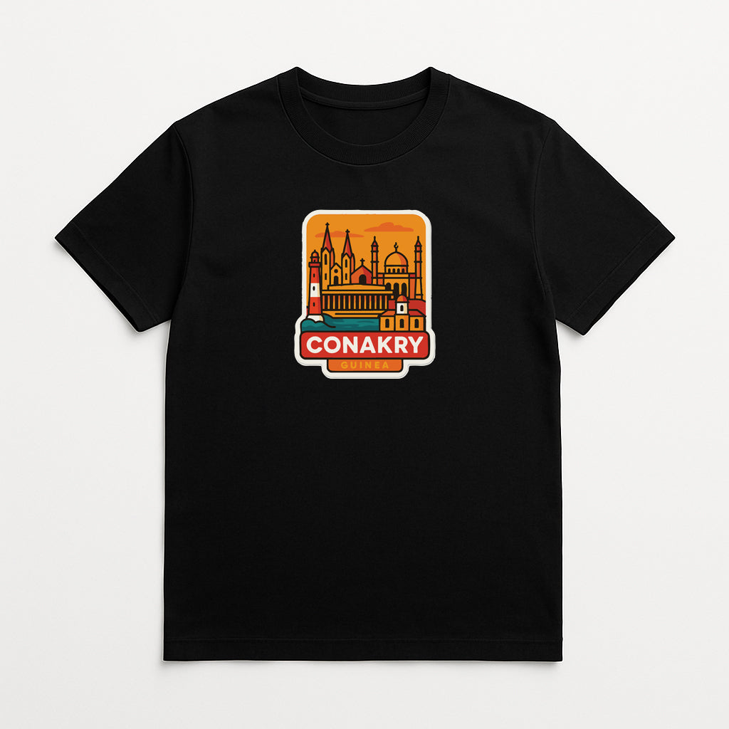 A black t-shirt with a graphic design depicting the Conakry skyline, which is a city in Ireland.
