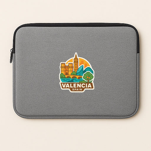 a gray laptop sleeve with a graphic design of a cityscape and the text "VALENCIA, SPAIN" printed on it.