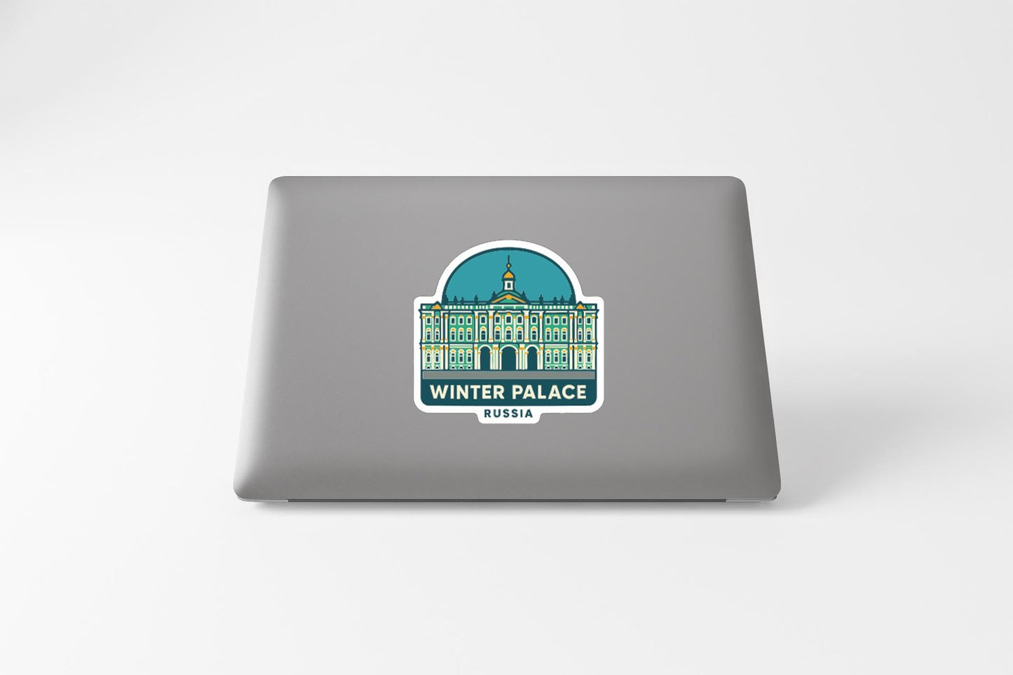 A sticker on the back of a laptop, depicting the Winter Palace in Russia.