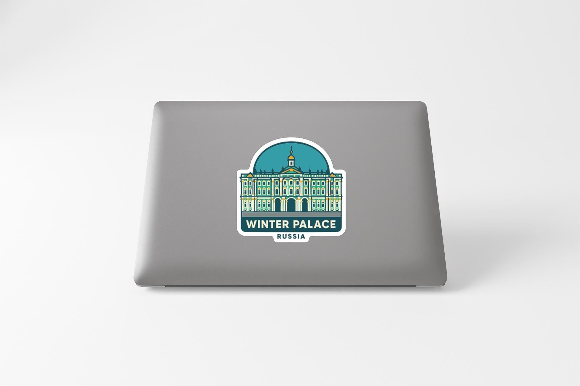 A sticker on the back of a laptop, depicting the Winter Palace in Russia.