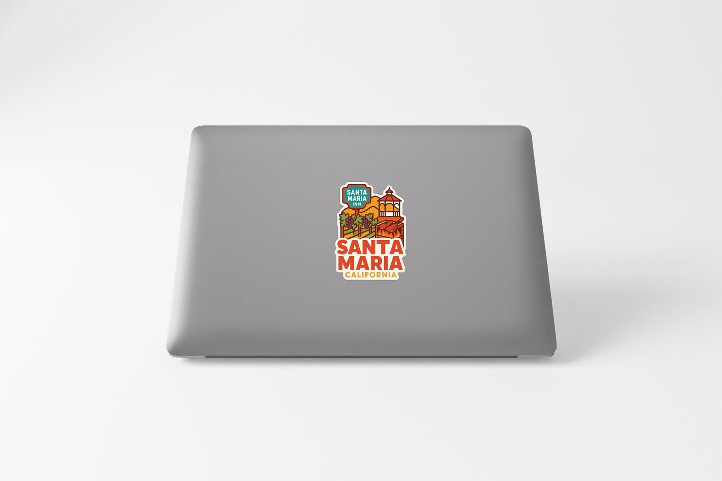 a sticker with the text "SANTA MARIA, CALIFORNIA" on the back of a laptop.