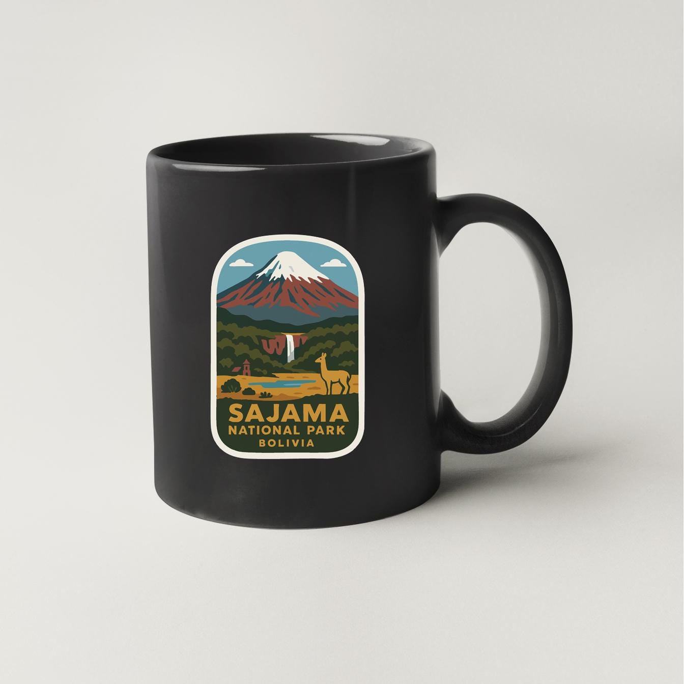 A black coffee mug with a graphic design depicting the Salama National Park in Bolivia.