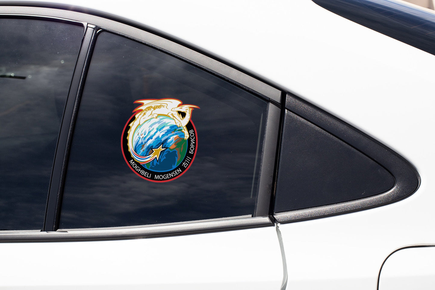 a close up of a car window with a sticker on it