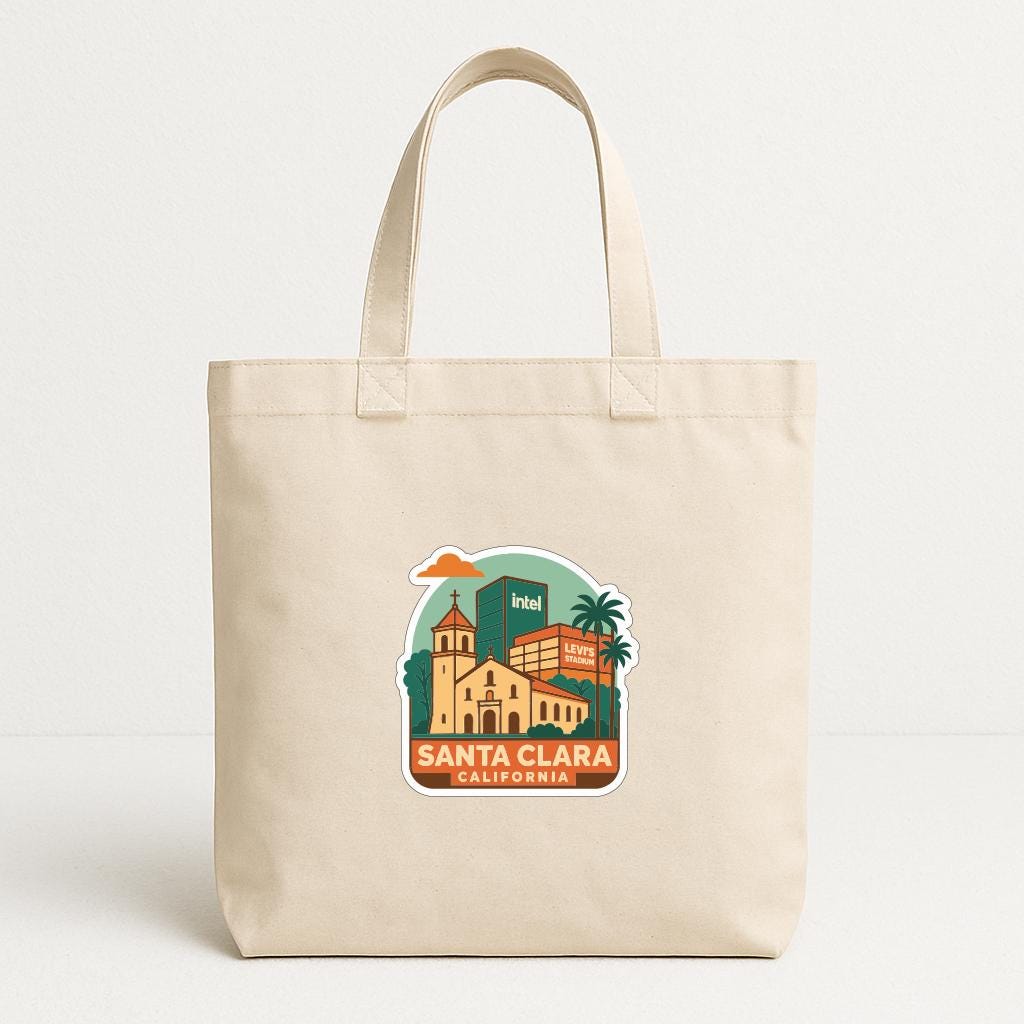 A beige tote bag with a printed design depicting Santa Clara, California.